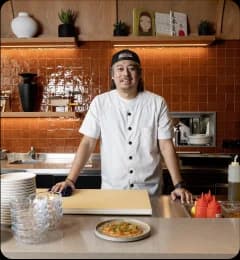 Chef standing in restaurant kitchen