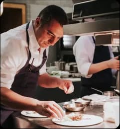 Chef plating food